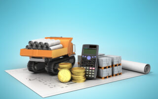 Construction truck carrying rolled blueprints, a calculator, stacks of concrete blocks, and gold coins on architectural plans, symbolizing financial planning and cost management in the construction industry.