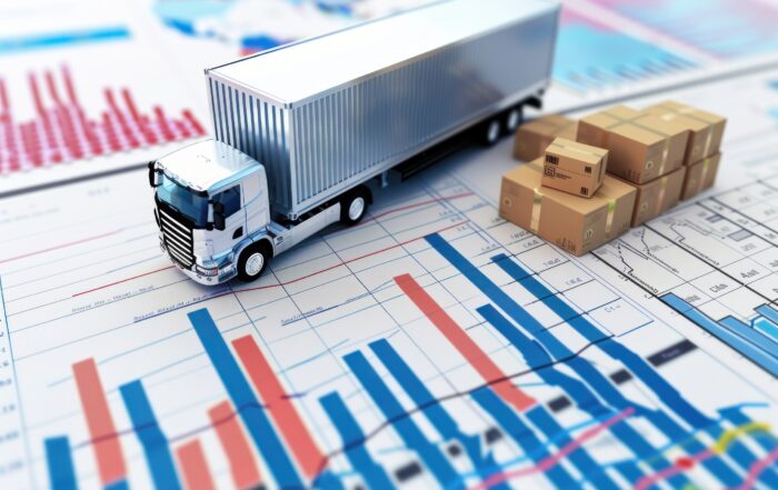 Truck and boxes on financial documents for logistics